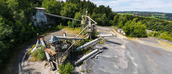 High angle view of road by river in forest