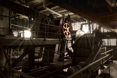 Low angle view of illuminated factory