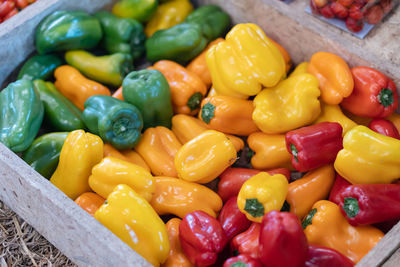 Close-up of multi colored bell peppers for sale in market