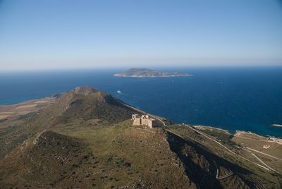 High angle view of sea against blue sky