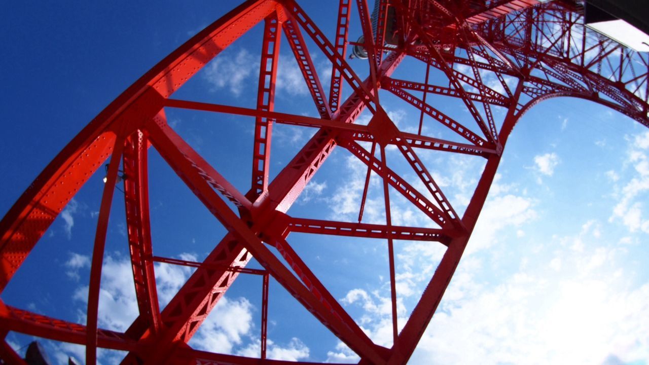 low angle view, metal, sky, built structure, metallic, architecture, blue, part of, connection, engineering, no people, bridge - man made structure, outdoors, sunlight, close-up, day, transportation, cropped, red, clear sky