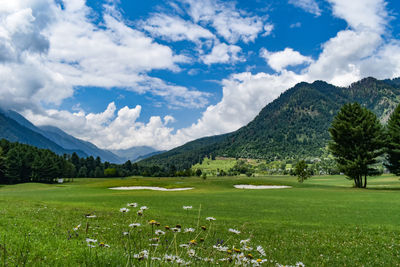 Beautiful view of a golf course at pahalgam kashmir, india.