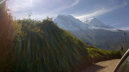 Panoramic view of snowcapped mountains against sky