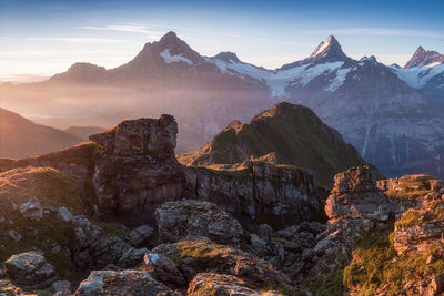 Scenic view of snowcapped mountains against sky