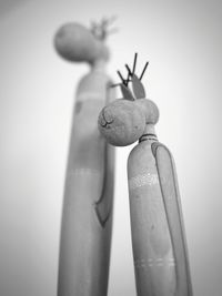 Close-up of stuffed toy against wall