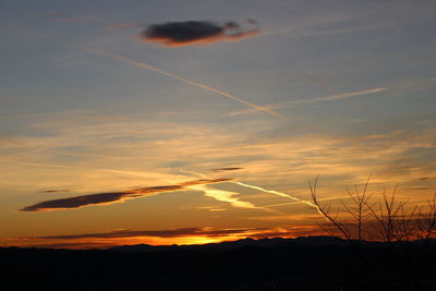 Scenic view of silhouette landscape against sky during sunset