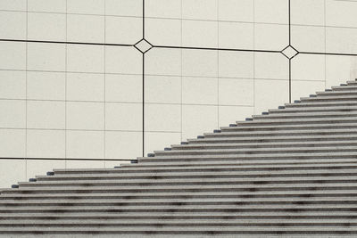 Staircase against building in city