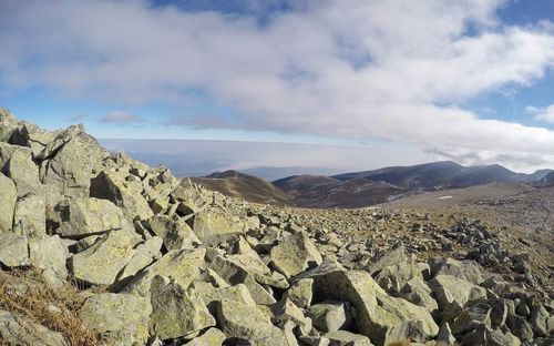 Panoramic view of rocky mountains against sky