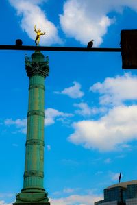 Low angle view of built structure against blue sky