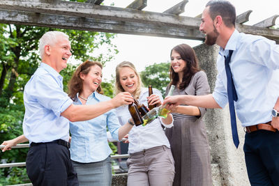 Group of two people drinking water