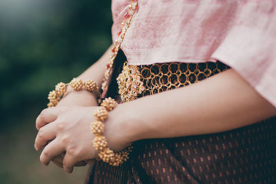 Close-up of woman holding hands