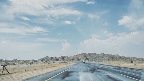 Country road passing through landscape