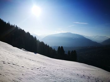 Scenic view of mountains against sky during winter