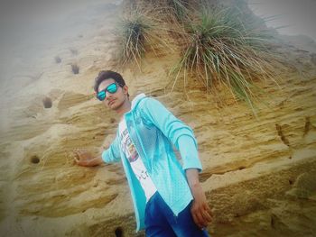 High angle view of man standing on beach