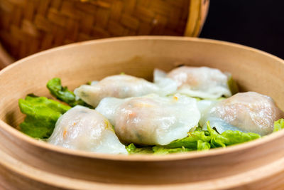 Close-up of dim sums in container