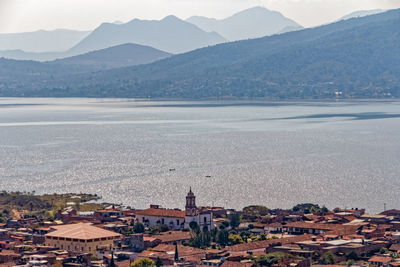 Townscape by lake patzcuaro against mountains