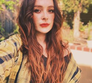 Portrait of beautiful young woman with long hair