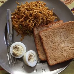 High angle view of breakfast served on table