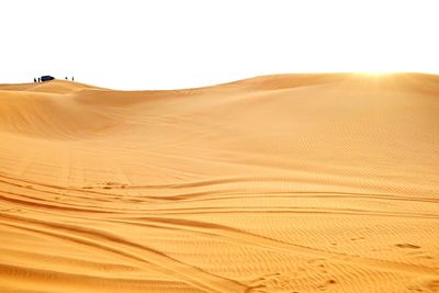 Scenic view of desert against clear sky