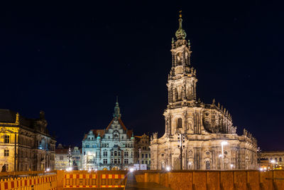 Illuminated cathedral against sky at night