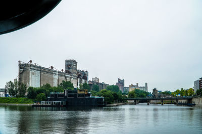 River by city against clear sky