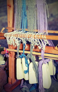 Close-up of clothes hanging for sale