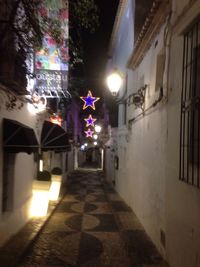 Illuminated street light at night