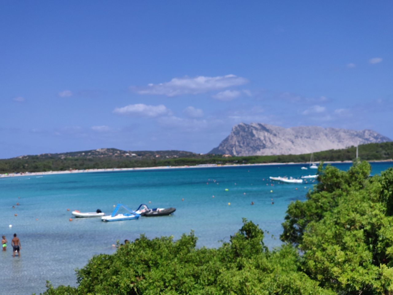 SCENIC VIEW OF BAY AGAINST CLEAR SKY