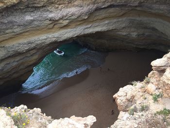 High angle view of rock formation in sea