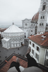 Low section of man on terrace against florence cathedral