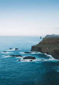 Scenic view of sea against clear sky