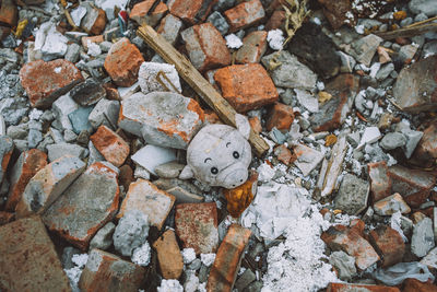 High angle view of stones on field
