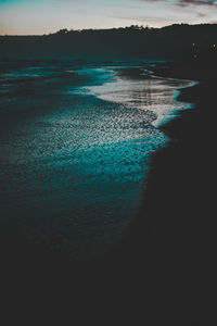 Scenic view of beach during sunset