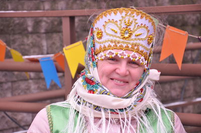 Portrait of smiling woman wearing hat