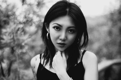 Close-up portrait of a serious young woman