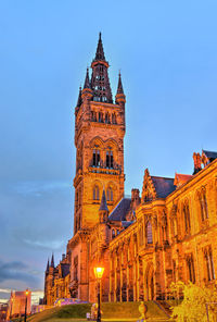 Low angle view of historical building against blue sky