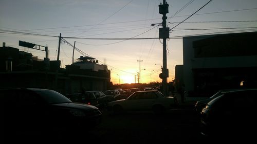 Electricity pylons at sunset