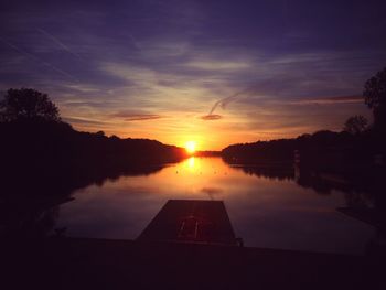 Scenic view of sunset over river