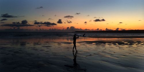 Scenic view of sea at sunset