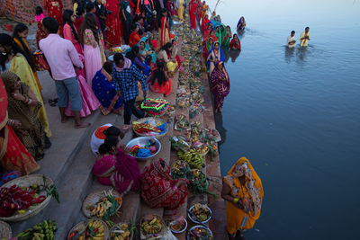 High angle view of people in rice on the occasion of chhath puja festival.