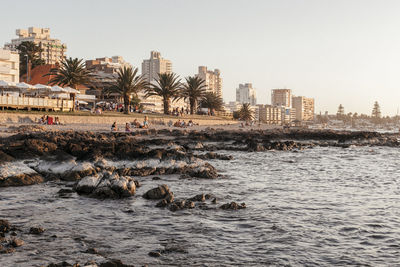 Sea with city in background