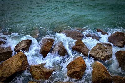 Waves splashing on rocks