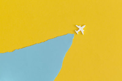 Directly above shot of gift box on blue background