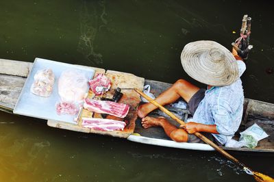 High angle view of man in rowboat