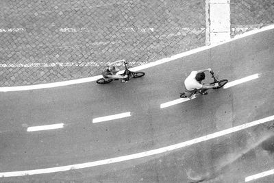 High angle view of bicycling on road