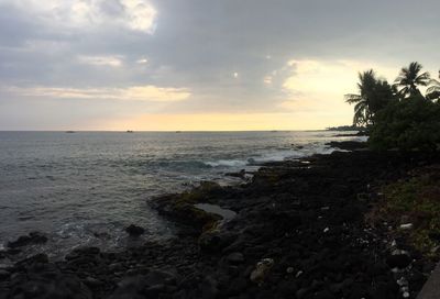 Scenic view of sea at sunset