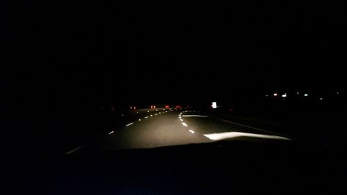 Cars on road at night