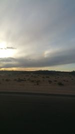 Scenic view of sea against sky at sunset