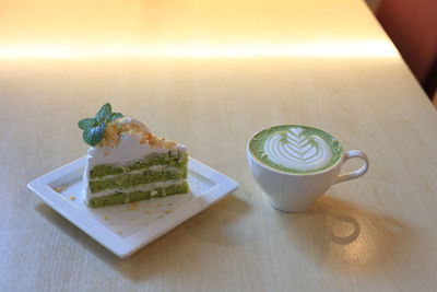 Close-up of coffee served on table