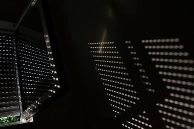 Low angle view of illuminated ceiling